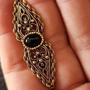 Vintage-Inspired Gold Filigree Brooch with Black Stone